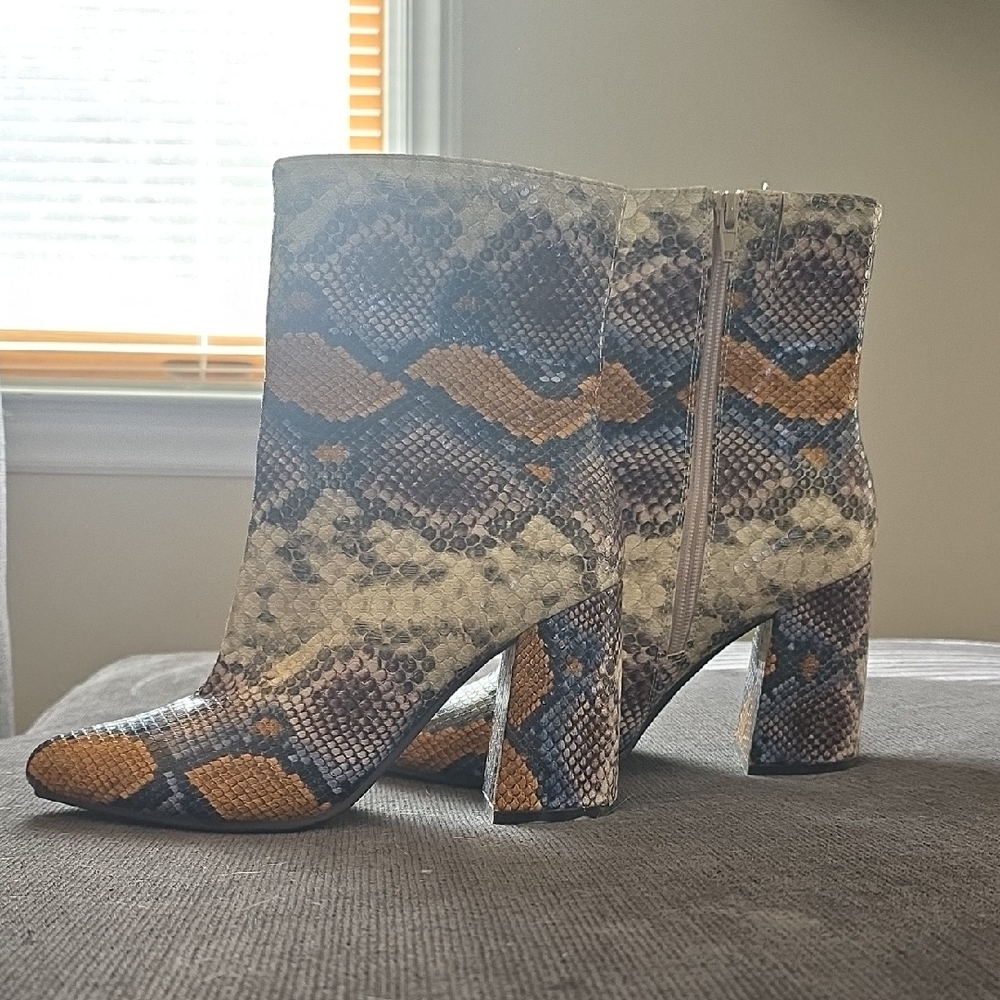 The Limited Multicolor Snakeskin Heeled Boots